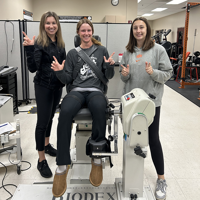 Golfers in the lab on the Biodex machine