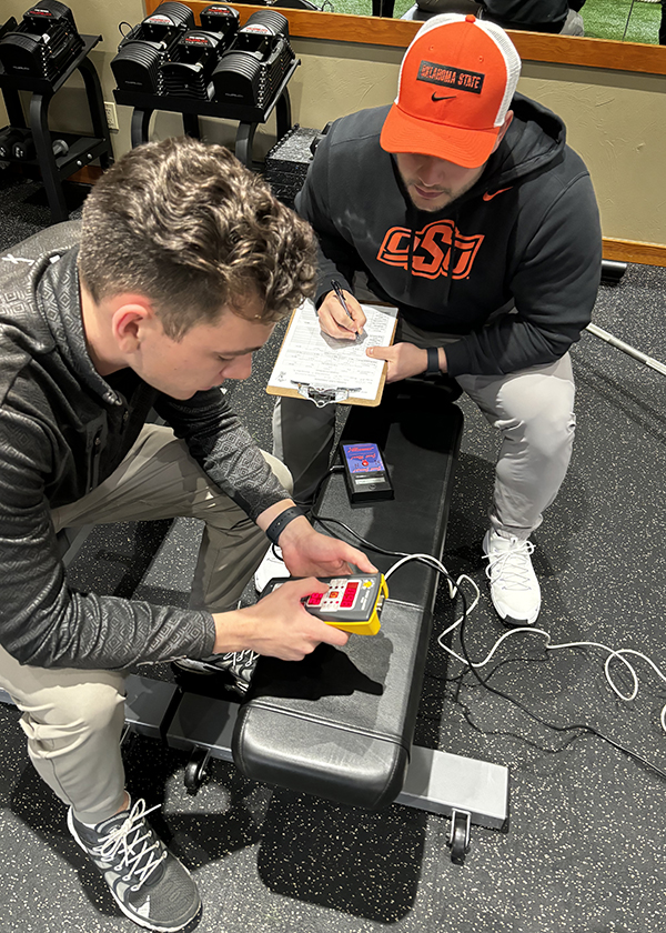 students in the lab looking over data