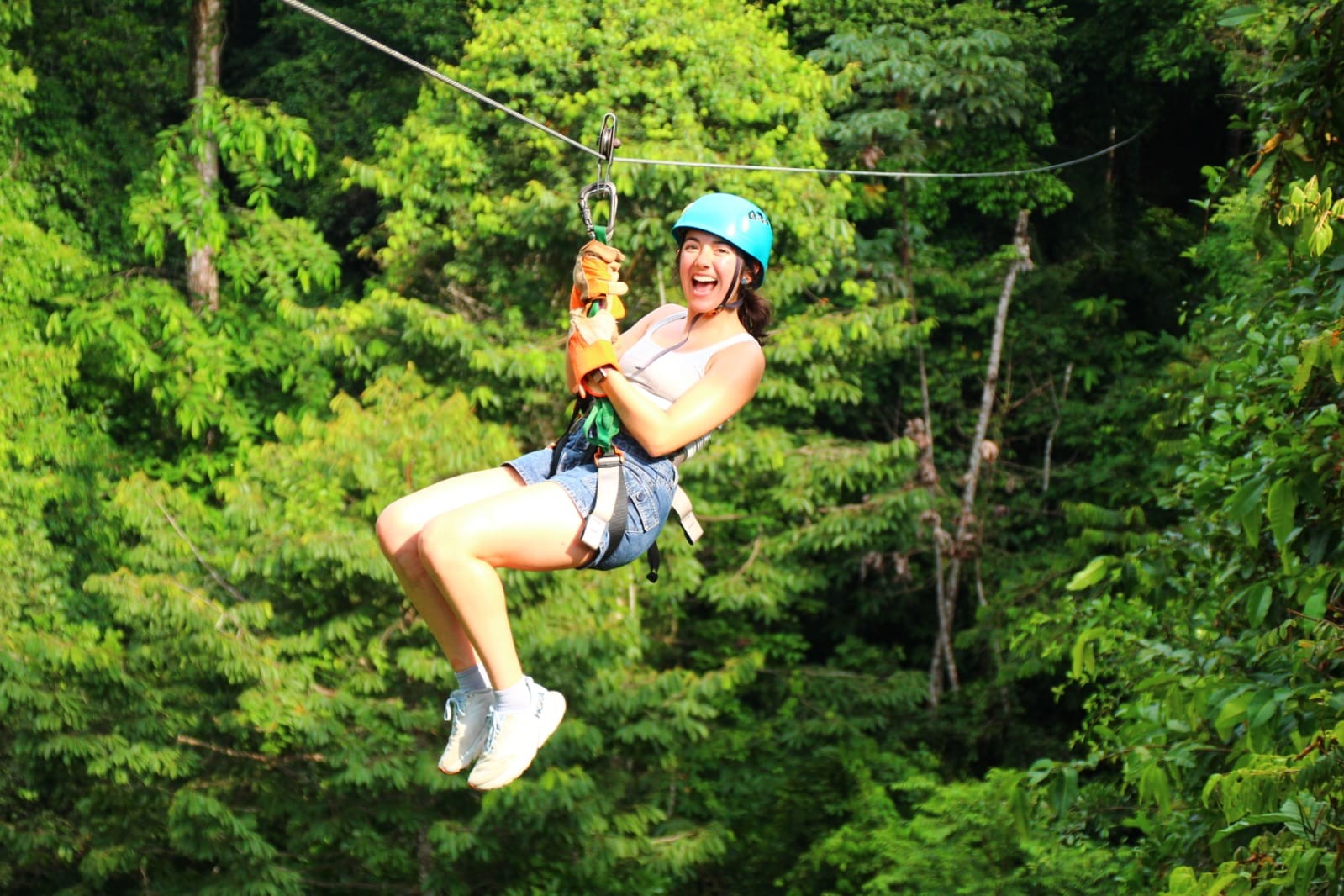 Student ziplining through the trees in Costa Rica