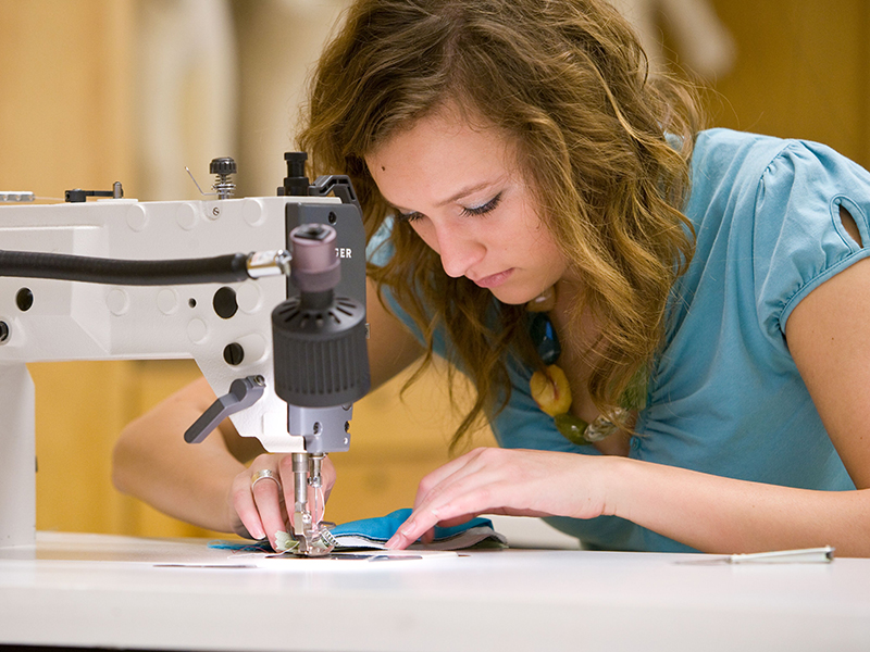 Student using a sewing machine